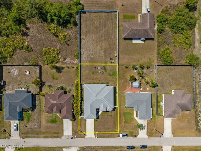 3407 20th St SW, Lehigh Acres, FL 33976 - drone / aerial view featuring a residential view