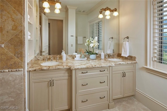 full bathroom featuring double vanity, a sink, crown molding, and visible vents