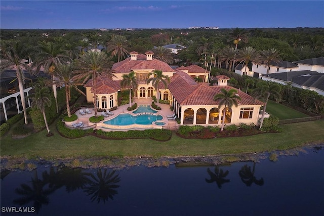 drone / aerial view with a water view