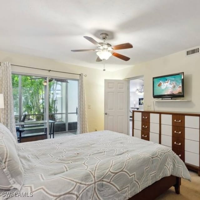 3130 Kings Lake Blvd Unit 7543, Naples, FL 34112 - carpeted bedroom with visible vents, ceiling fan, and access to outside