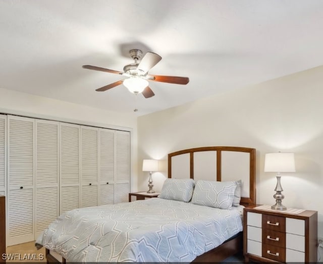 3130 Kings Lake Blvd Unit 7543, Naples, FL 34112 - bedroom featuring a closet and a ceiling fan