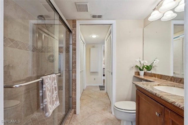 3130 Kings Lake Blvd Unit 7543, Naples, FL 34112 - full bathroom with vanity, visible vents, a stall shower, and toilet