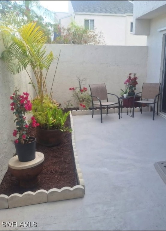 3130 Kings Lake Blvd Unit 7543, Naples, FL 34112 - view of patio
