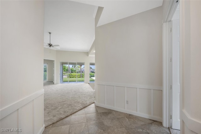 8511 Alessandria Ct, Naples, FL 34114 - corridor featuring wainscoting, carpet floors, and a decorative wall