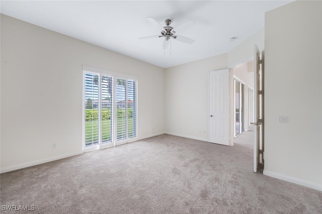 8511 Alessandria Ct, Naples, FL 34114 - carpeted spare room with baseboards and ceiling fan