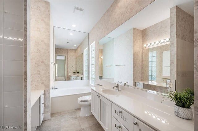 8511 Alessandria Ct, Naples, FL 34114 - full bathroom featuring toilet, vanity, tile walls, and a bath