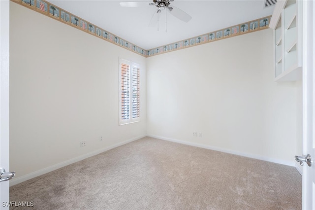8511 Alessandria Ct, Naples, FL 34114 - carpeted spare room with baseboards, visible vents, and ceiling fan