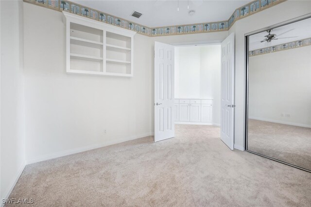 8511 Alessandria Ct, Naples, FL 34114 - unfurnished bedroom with baseboards, visible vents, a closet, and carpet