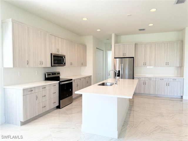 5048 Gambero Way, Ave Maria, FL 34142 - kitchen with a sink, light countertops, appliances with stainless steel finishes, and marble finish floor