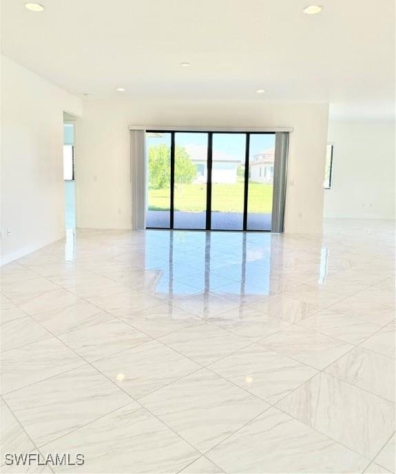 5048 Gambero Way, Ave Maria, FL 34142 - spare room featuring recessed lighting and marble finish floor