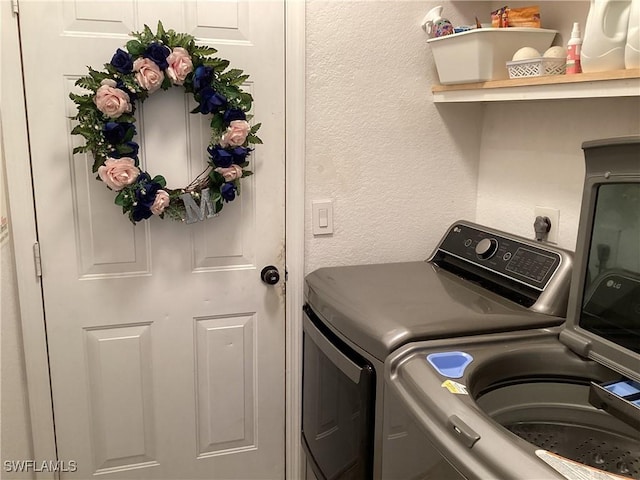 2939 Orange Grove Trl, Naples, FL 34120 - washroom featuring washing machine and clothes dryer and a textured wall