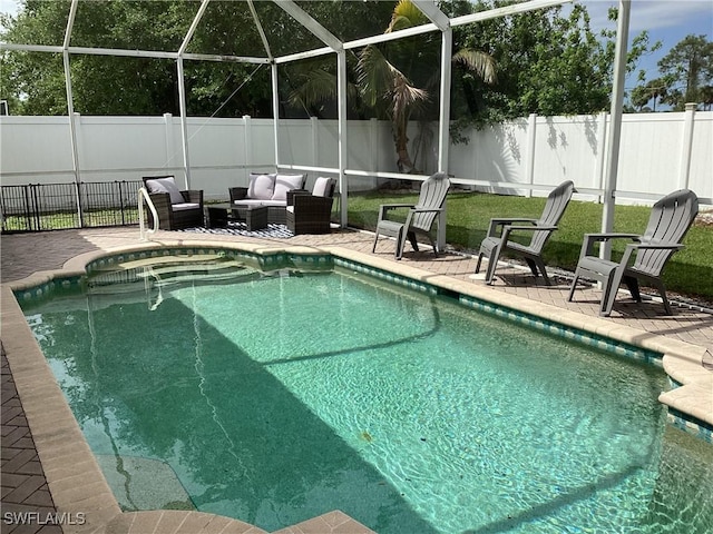 2939 Orange Grove Trl, Naples, FL 34120 - view of pool with a fenced backyard, a patio area, and a lanai