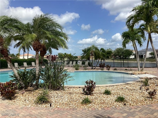 2939 Orange Grove Trl, Naples, FL 34120 - community pool featuring fence