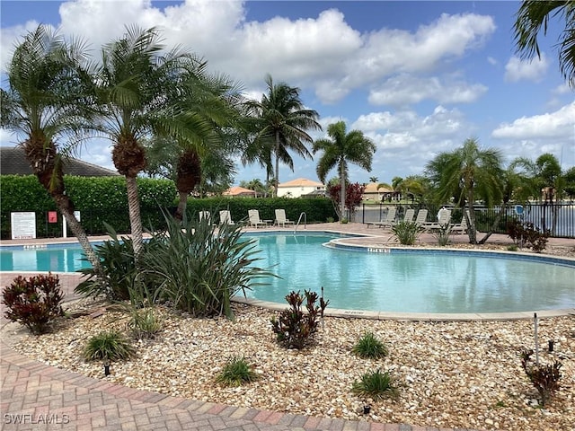 2939 Orange Grove Trl, Naples, FL 34120 - community pool featuring fence