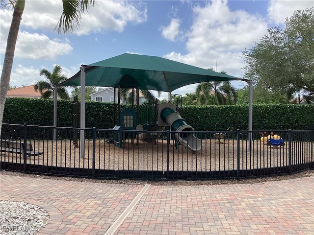 2939 Orange Grove Trl, Naples, FL 34120 - community jungle gym featuring fence