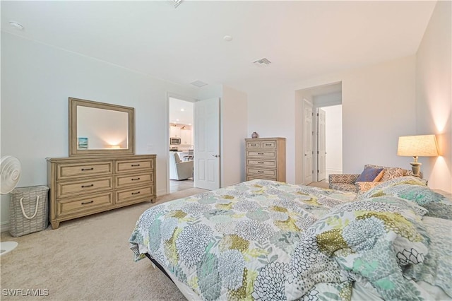 2916 Royal Gardens Ave, Fort Myers, FL 33916 - bedroom featuring light carpet, visible vents, and baseboards