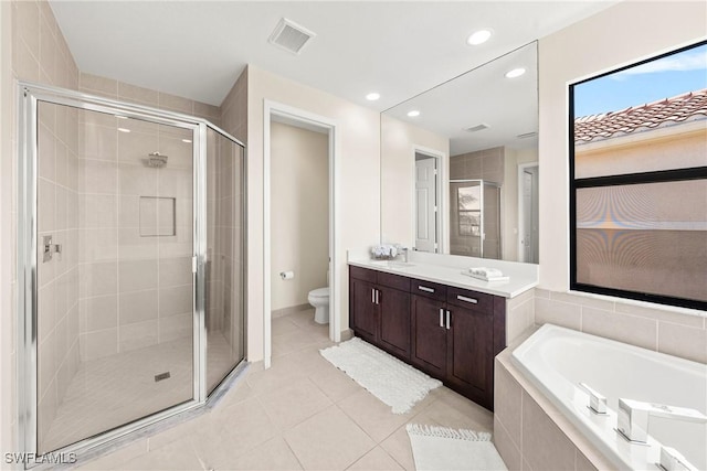 bathroom with toilet, a bath, tile patterned flooring, and a shower stall