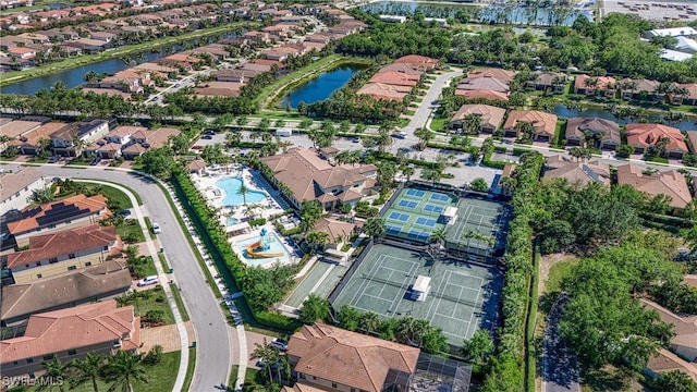 aerial view featuring a residential view and a water view