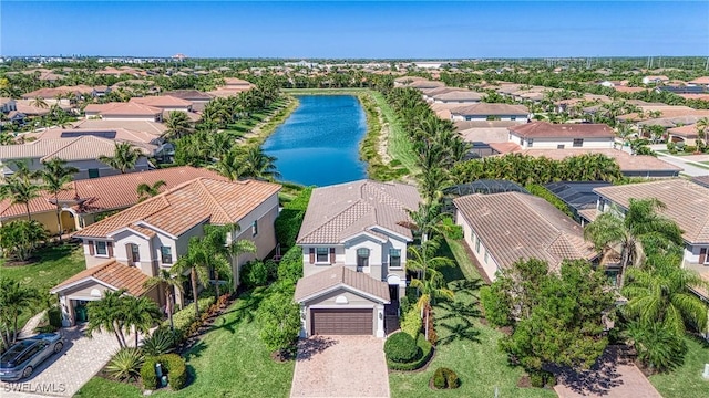 aerial view with a water view and a residential view