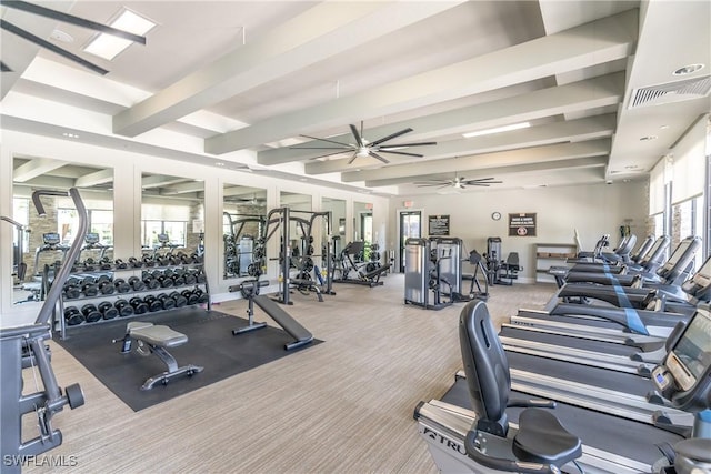 exercise room featuring ceiling fan, visible vents, and carpet
