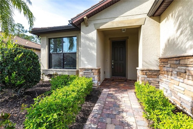 10870 Maitland Way, Fort Myers, FL 33913 - entrance to property with stucco siding and stone siding