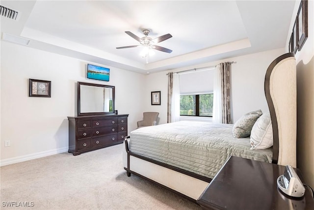 10870 Maitland Way, Fort Myers, FL 33913 - bedroom featuring a tray ceiling, carpet, baseboards, and ceiling fan