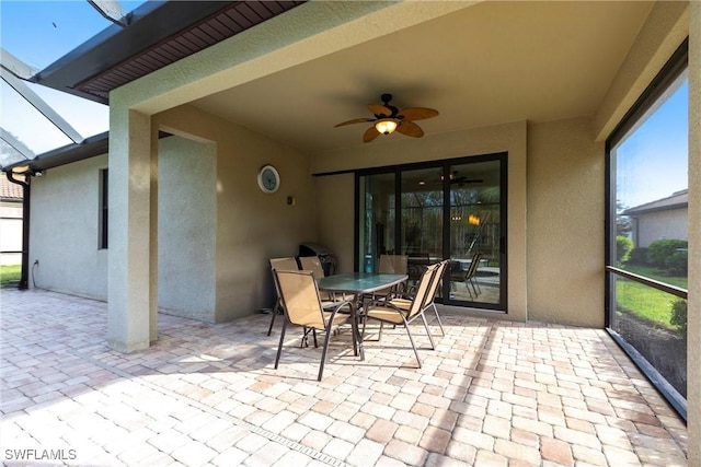10870 Maitland Way, Fort Myers, FL 33913 - view of patio featuring a ceiling fan, a lanai, and outdoor dining space