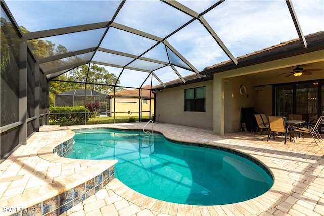 10870 Maitland Way, Fort Myers, FL 33913 - outdoor pool with a patio area, ceiling fan, and outdoor dining area