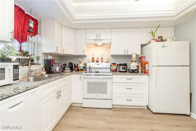 402 SE 42nd Ter Unit D 5, Cape Coral, FL 33904 - kitchen with white cabinets, a sink, under cabinet range hood, and white appliances