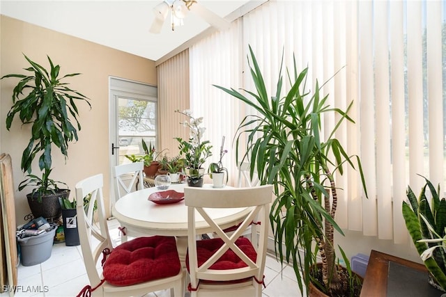 402 SE 42nd Ter Unit D 5, Cape Coral, FL 33904 - dining area with ceiling fan and light tile patterned floors