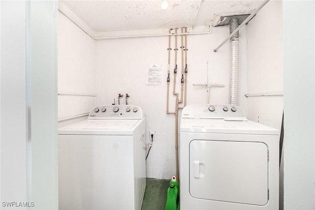402 SE 42nd Ter Unit D 5, Cape Coral, FL 33904 - clothes washing area featuring washer and dryer and laundry area