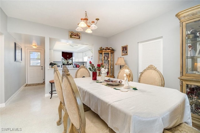 402 SE 42nd Ter Unit D 5, Cape Coral, FL 33904 - dining area with baseboards and a notable chandelier