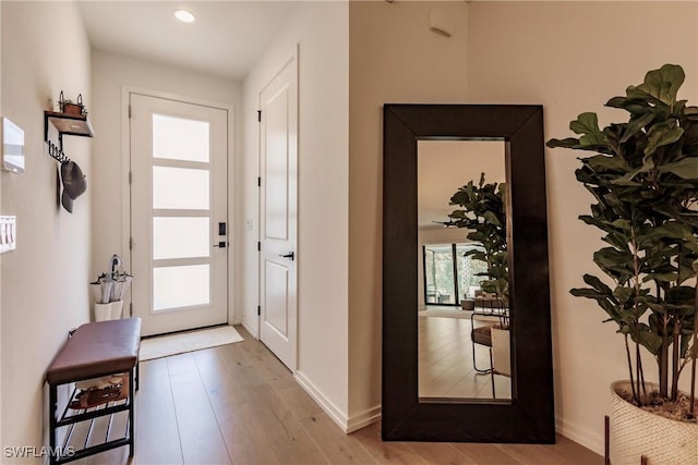 13005 Pembroke Dr, Naples, FL 34105 - entryway with baseboards, wood finished floors, and recessed lighting