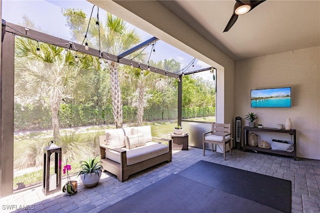 13005 Pembroke Dr, Naples, FL 34105 - view of patio / terrace featuring outdoor lounge area, glass enclosure, and a ceiling fan