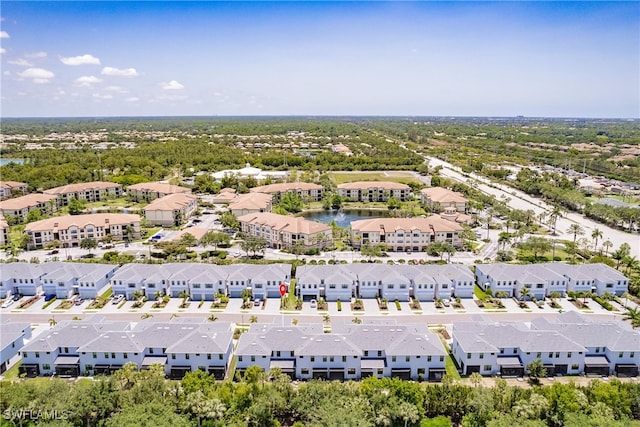 13005 Pembroke Dr, Naples, FL 34105 - drone / aerial view featuring a residential view and a water view