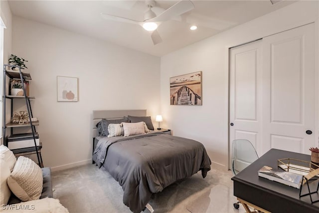 13005 Pembroke Dr, Naples, FL 34105 - bedroom featuring baseboards, ceiling fan, a closet, and light colored carpet