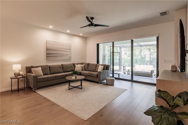 13005 Pembroke Dr, Naples, FL 34105 - living area featuring a ceiling fan, wood finished floors, baseboards, visible vents, and recessed lighting