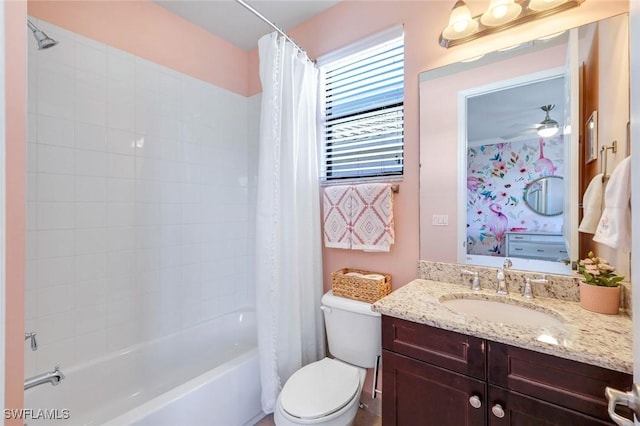 full bathroom featuring ceiling fan, toilet, vanity, and shower / bathtub combination with curtain