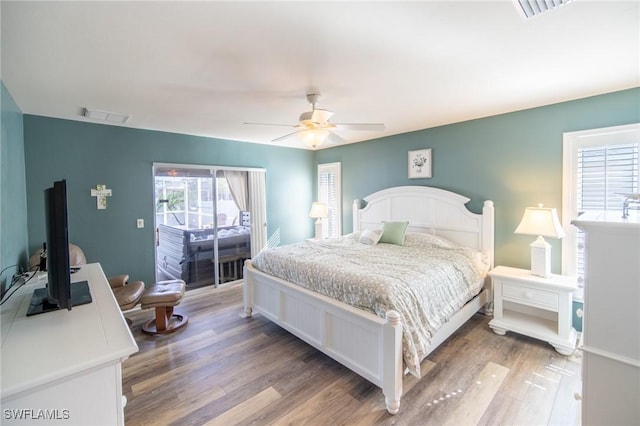 931 SW 35th Ter, Cape Coral, FL 33914 - bedroom with ceiling fan, visible vents, and wood finished floors