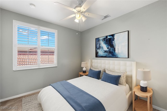 bedroom featuring carpet, baseboards, ceiling fan, and visible vents
