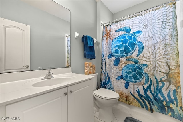full bath with a shower with curtain, tile patterned floors, toilet, and vanity