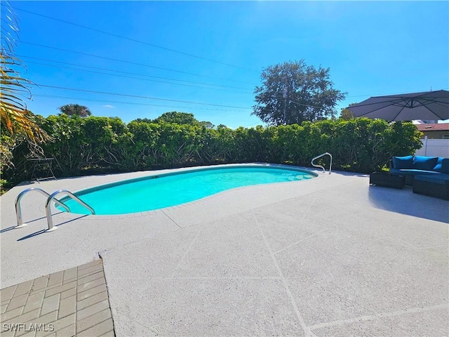 1312 Archdale St, Lehigh Acres, FL 33936 - view of pool featuring a patio area