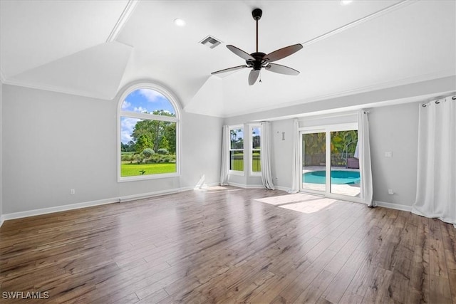 unfurnished living room with visible vents, baseboards, ceiling fan, wood finished floors, and lofted ceiling