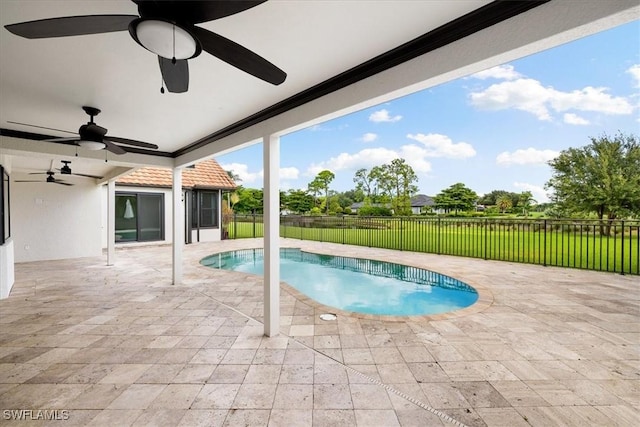 view of swimming pool featuring a fenced backyard and a patio area