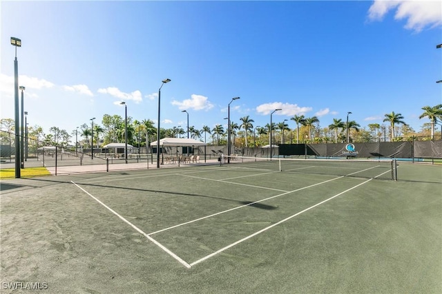 view of sport court with fence