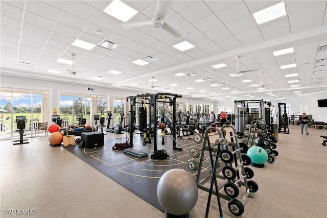 gym with visible vents and a drop ceiling
