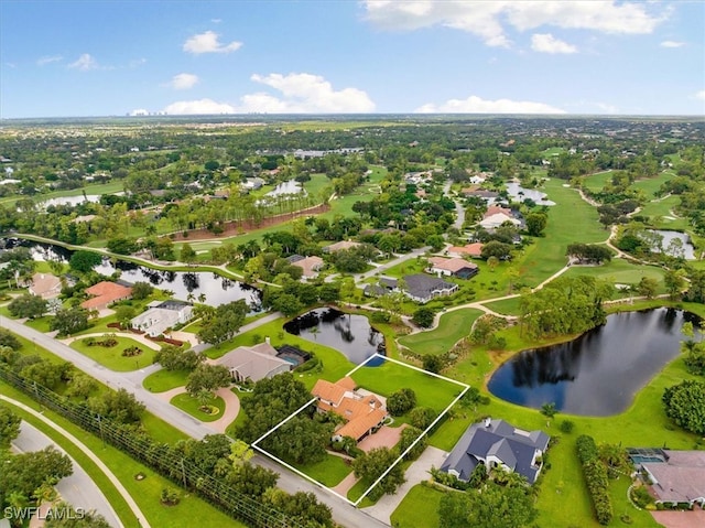 birds eye view of property with a residential view and a water view