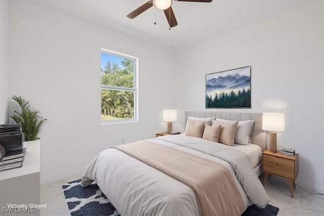 1508 Hibiscus Ave, Lehigh Acres, FL 33972 - bedroom featuring marble finish floor, baseboards, and ceiling fan