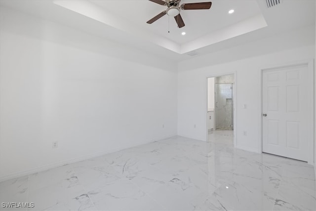 1508 Hibiscus Ave, Lehigh Acres, FL 33972 - unfurnished room with a tray ceiling, recessed lighting, baseboards, marble finish floor, and ceiling fan
