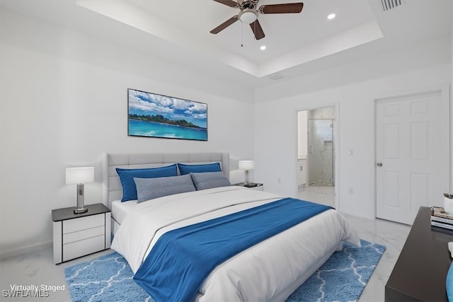 1508 Hibiscus Ave, Lehigh Acres, FL 33972 - bedroom with a raised ceiling, ensuite bath, marble finish floor, baseboards, and recessed lighting